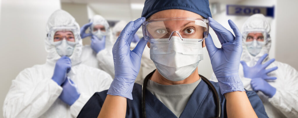 ppe waste management - medical frontliner wearing ppe
