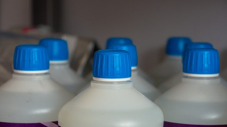 a picture of bleach bottles ready to be recycled