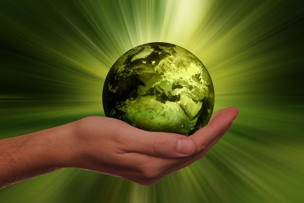 terracycle free recycling programs featured image - sustainability, hand holding green globe