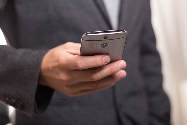 waste to gold businessman holding phone